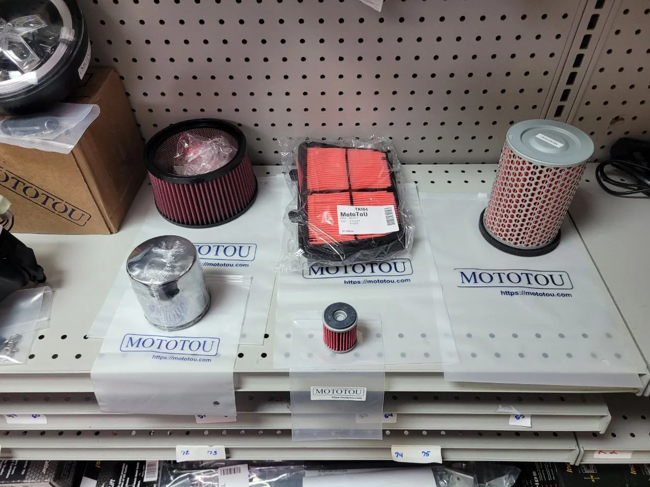 MOTOTOU air and oil filters in branded packaging on a retail shelf
